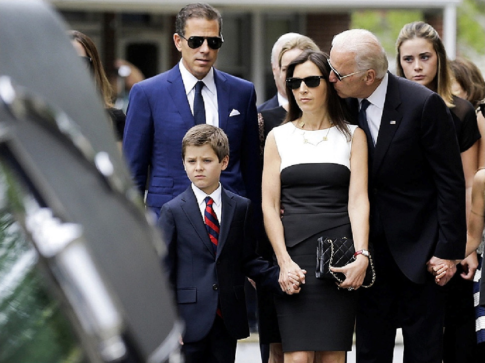 Joe Biden kissing his daughter-in-law