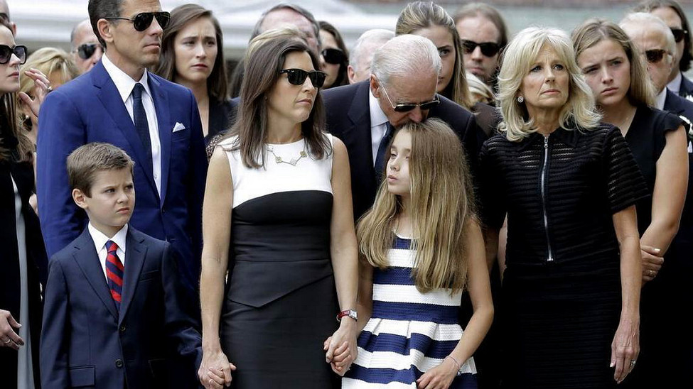 Joe Biden sniffing his grand-daughter