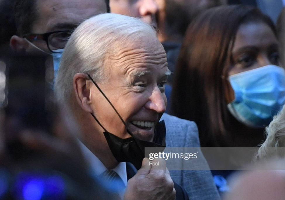 Joe Biden's ear tag for mask removal?