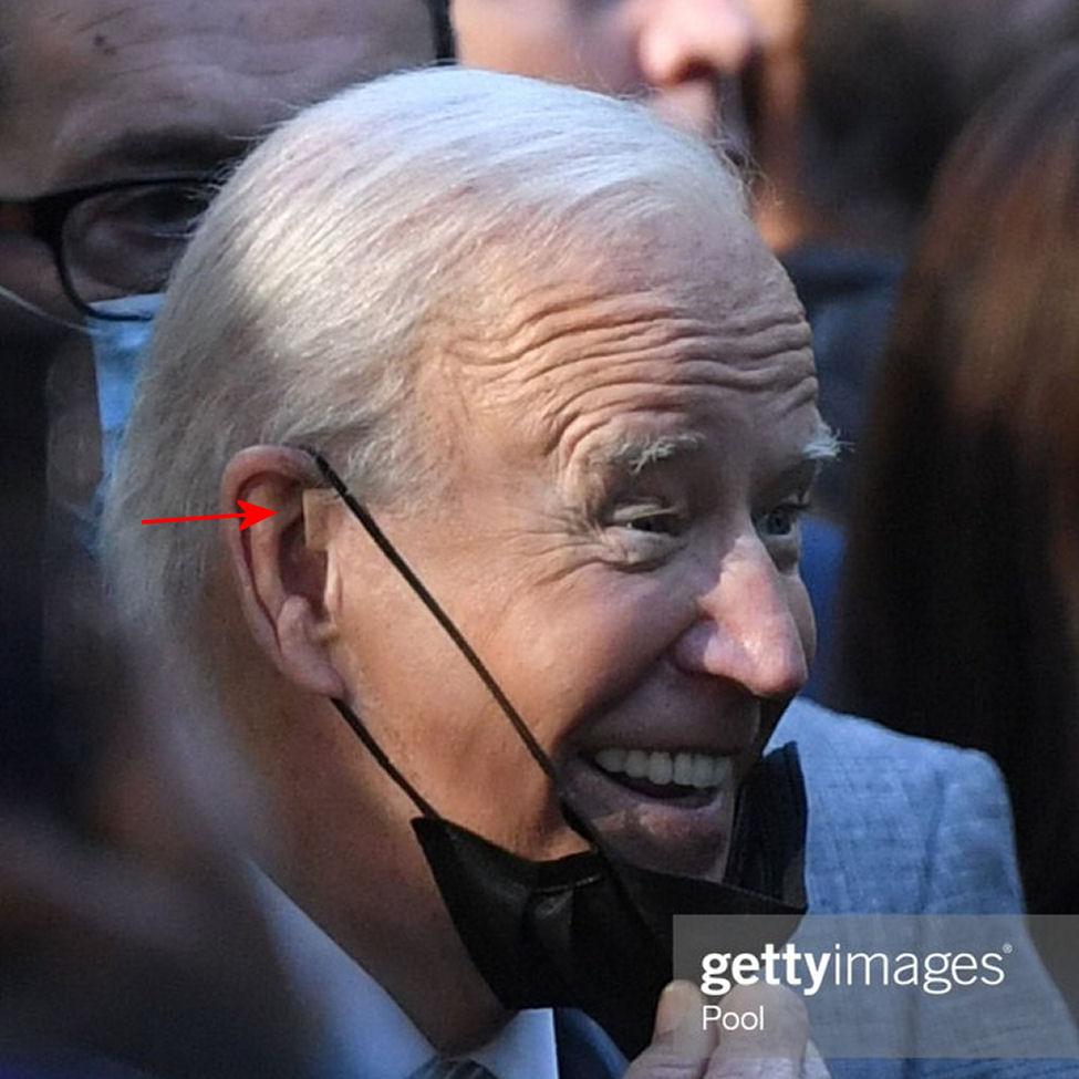 Joe Biden's ear tag for mask removal?