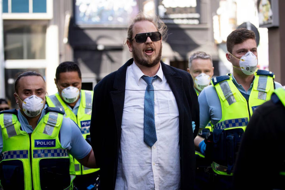 Police arrested anti-lockdown protester Vincent Eastwood outside TVNZ in August 2021. Photo / Dean Purcell